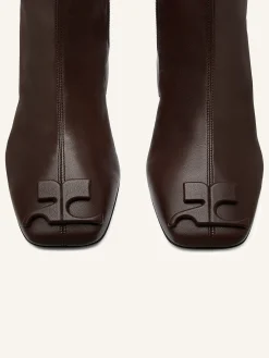 REEDITION STRETCH LEATHER EFFECT BOOTS