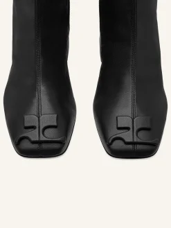REEDITION STRETCH LEATHER EFFECT BOOTS