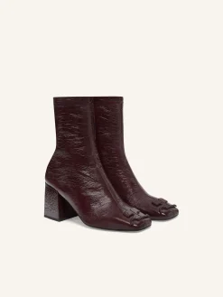 REEDITION VINYL ANKLE BOOTS