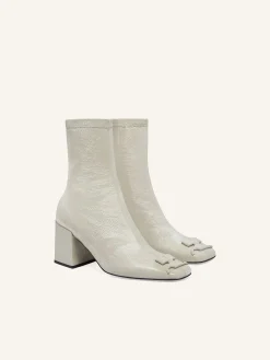 REEDITION VINYL ANKLE BOOTS